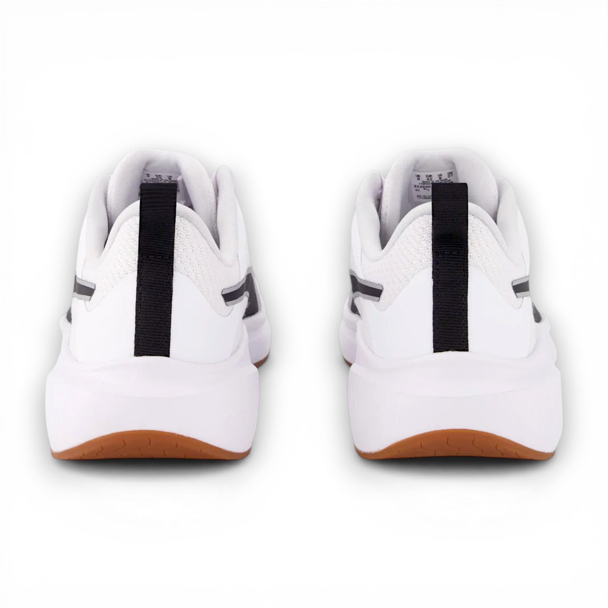 White sneakers with black stripes on a white background