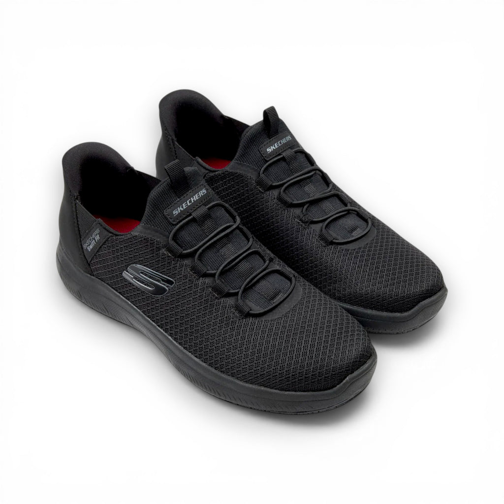 Black athletic shoes with a red interior on a white background