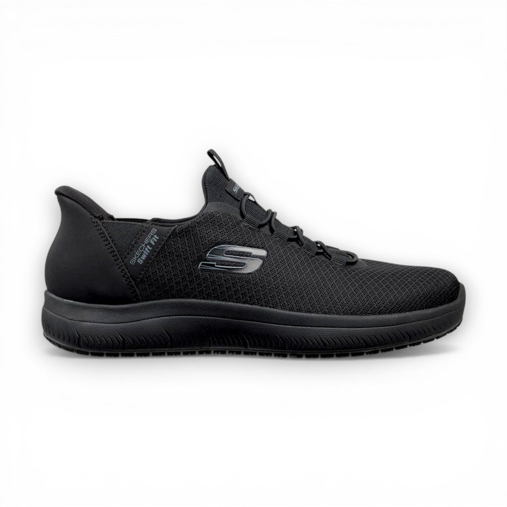 Black athletic shoe with red sole on a white background