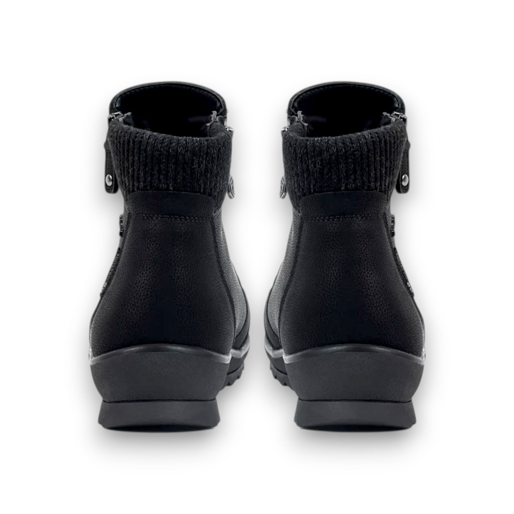 Black rubber boots with knit cuffs on a white background