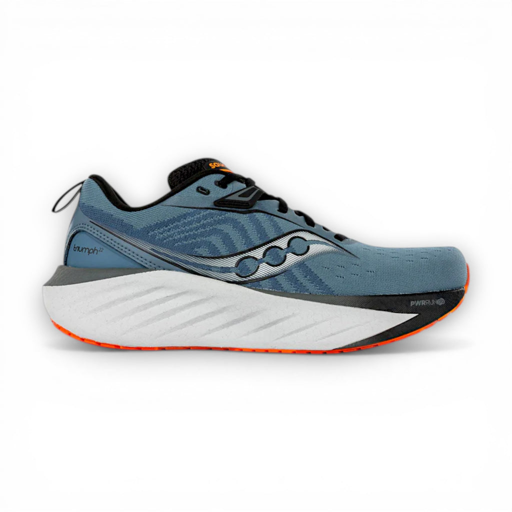 Blue running shoe with white sole on a white background