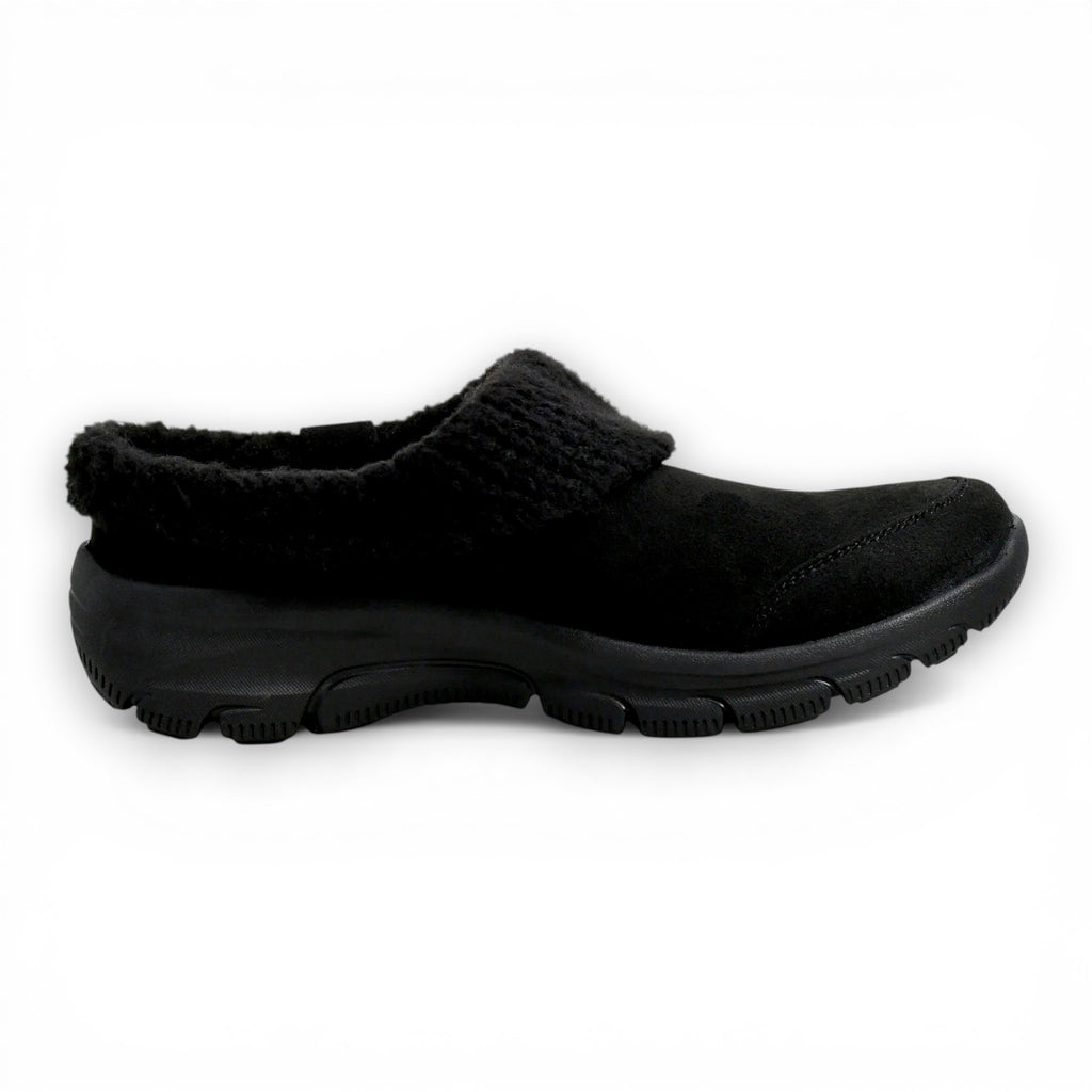 Black slip-on shoe with fuzzy lining on a white background