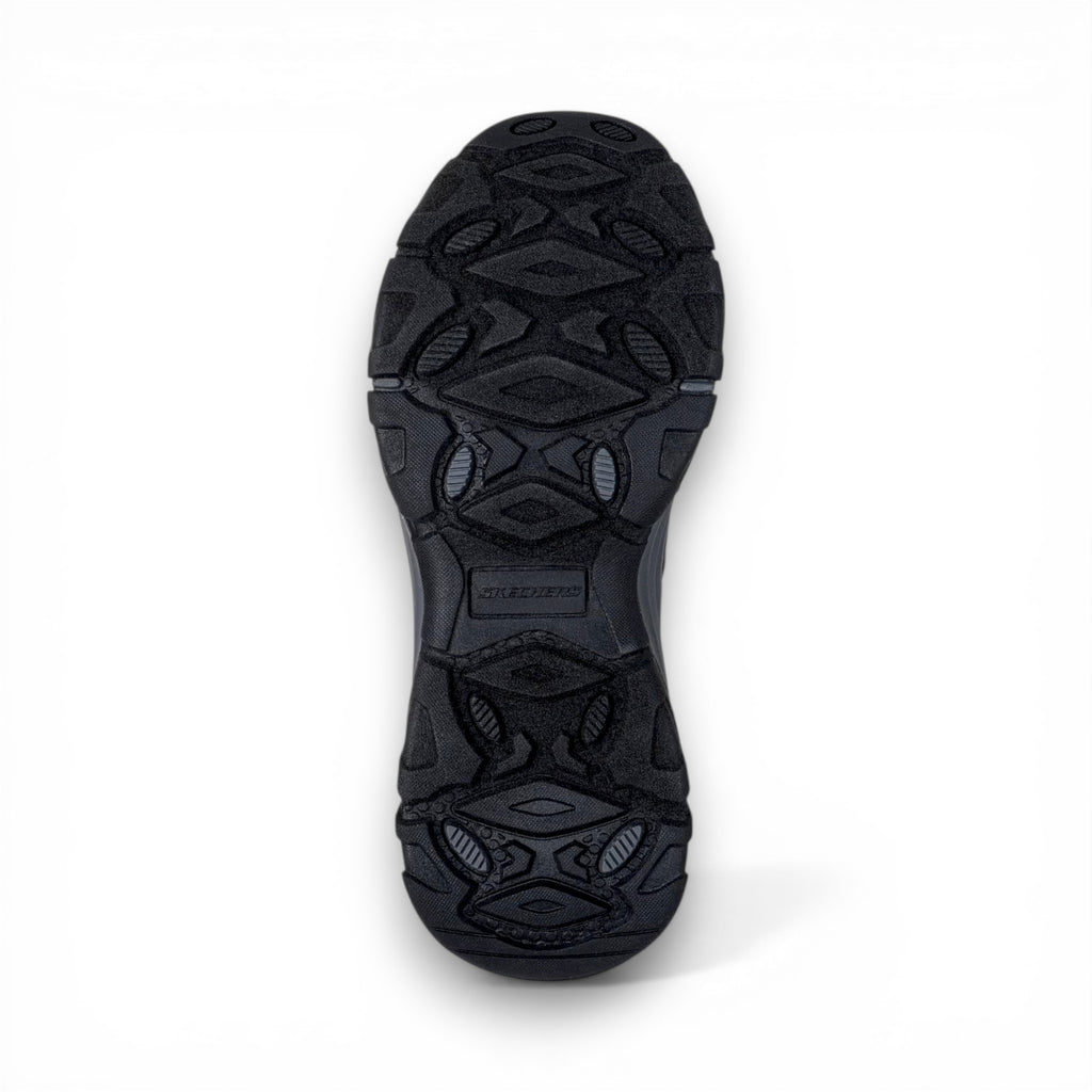 Black shoe sole with geometric pattern on a white background