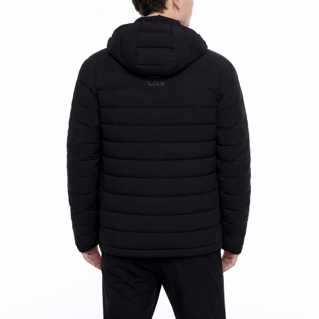 Black puffer jacket with brand logo on the back, worn by a person on a white background