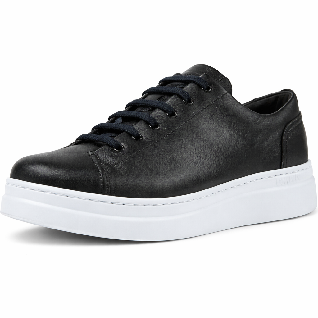 Black leather sneaker with white sole on a white background