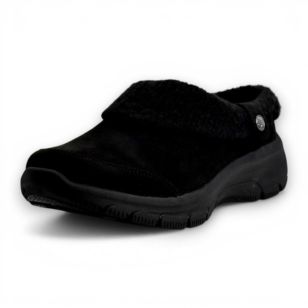 Black slip-on shoe on a white background