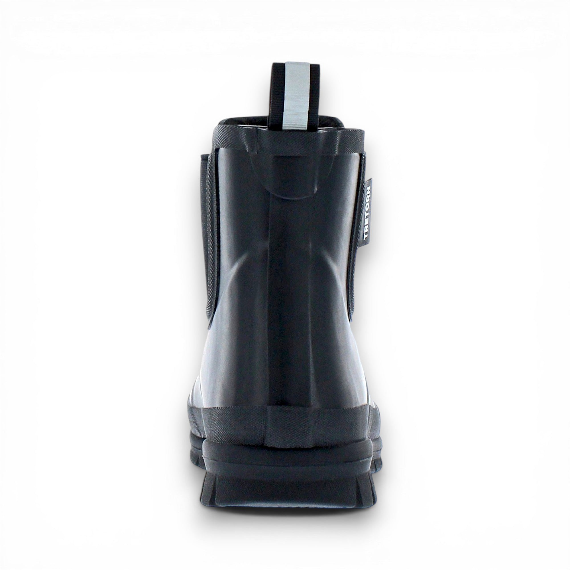Black rain boot with a visible brand label on a white background